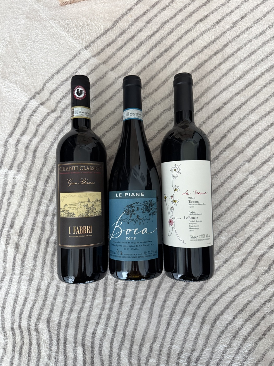 I Fabbri’s Chianti Classico Gran Selezione 2018, Le Piane’s ‘Boca’ 2019 and Podere le Boncie’s ‘Le Trame’ 2022.