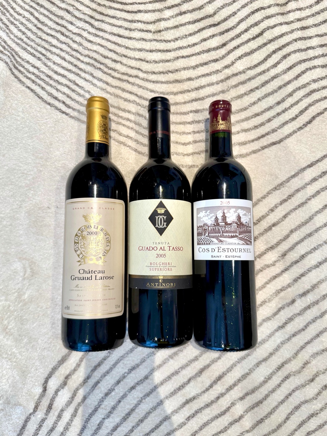 Chateau Gruaud Larose 2005, Guado al Tasso 2005, and Cos d’Estournel 2005.